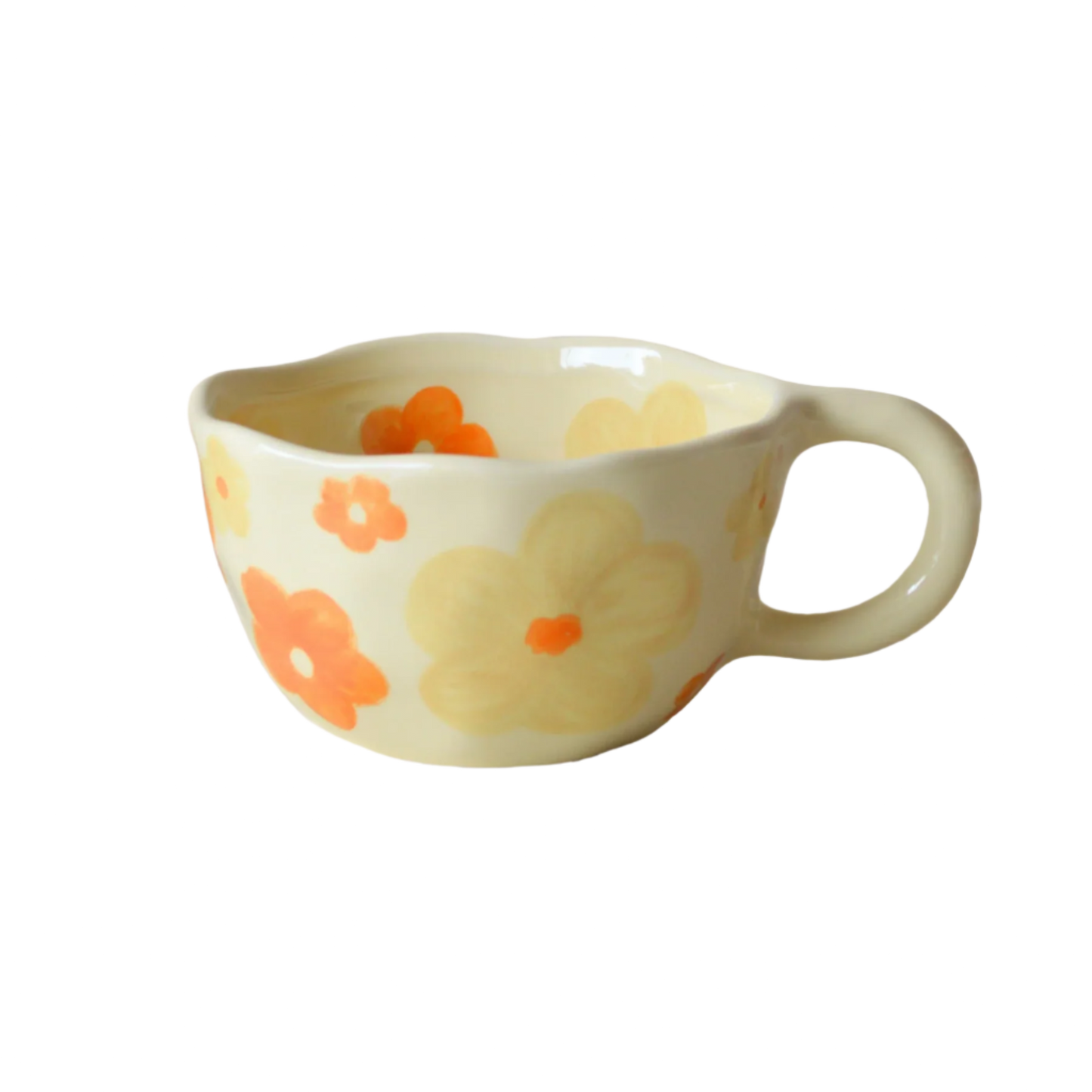 a cream based ceramic mug with yellow and orange flower pattern product