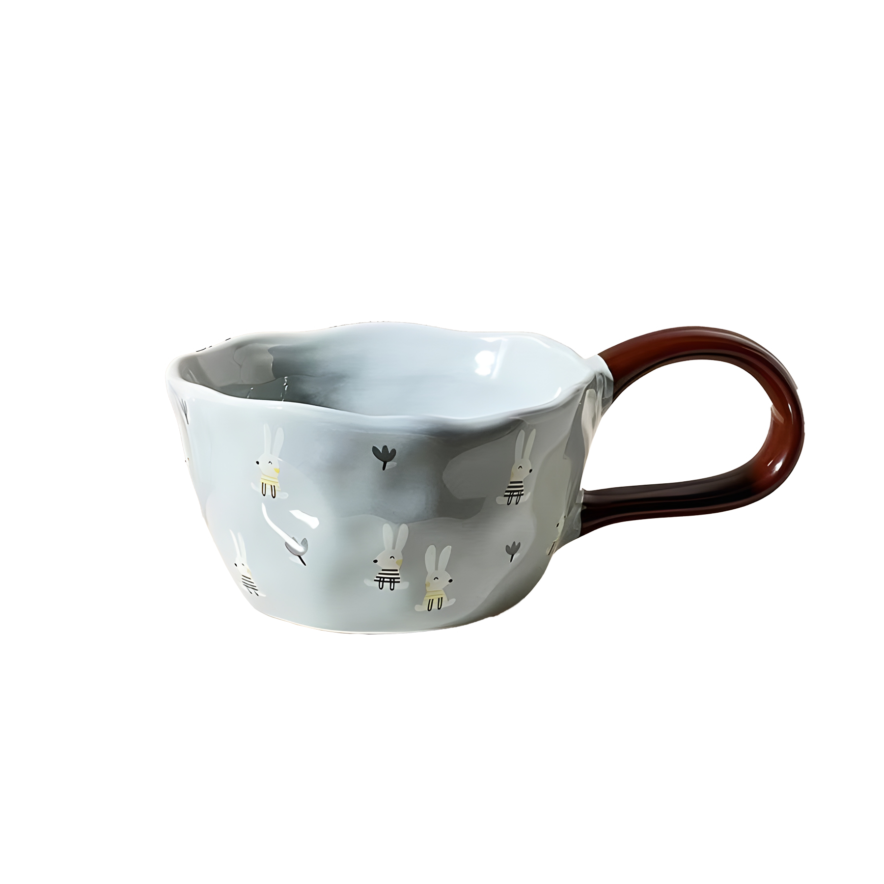 a blue bunny and tulip patterned ceramic mug with brown big loop handle product photo
